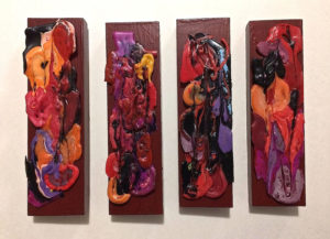 Reflection on Red, Recycled Melted Plastic Bottle Caps by Elizabeth Shumate, 3in x 9in each panel, $125 (April 2019)
