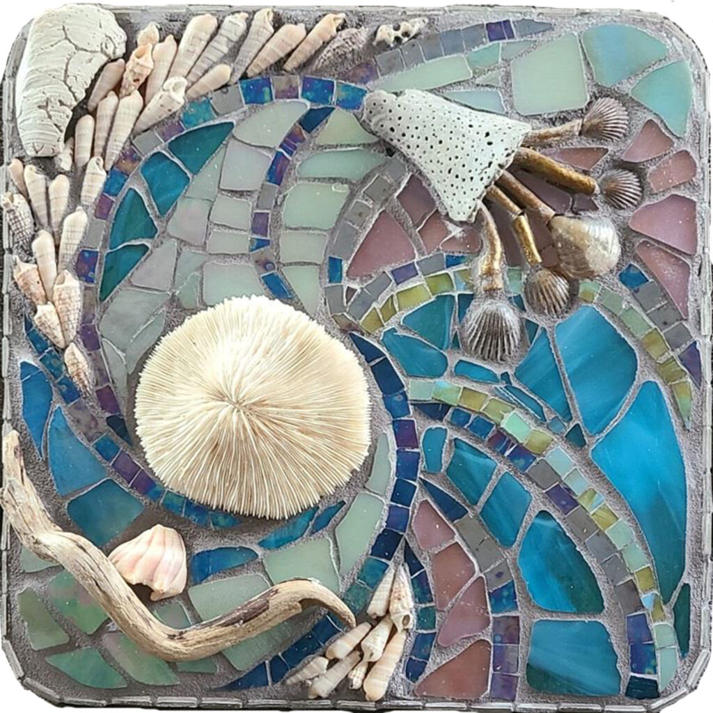 HONORABLE MENTION: Fond Memories, Mosaic-Glass, Shells, Wood by Tresa Lohr, 10in x 10in, $100 (August 2021)