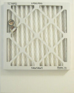 Air Filter Reverse Side with a Placed Pin Figure #1, Assemblage by John Nichols, 20in x 16in, $300 (October 2021) 