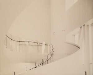 Swooping Staircase in White, Archival Metallic Photo by Deborah D. Herndon, 16in x 20in, $160 (Dec. 2021- Jan. 2022)