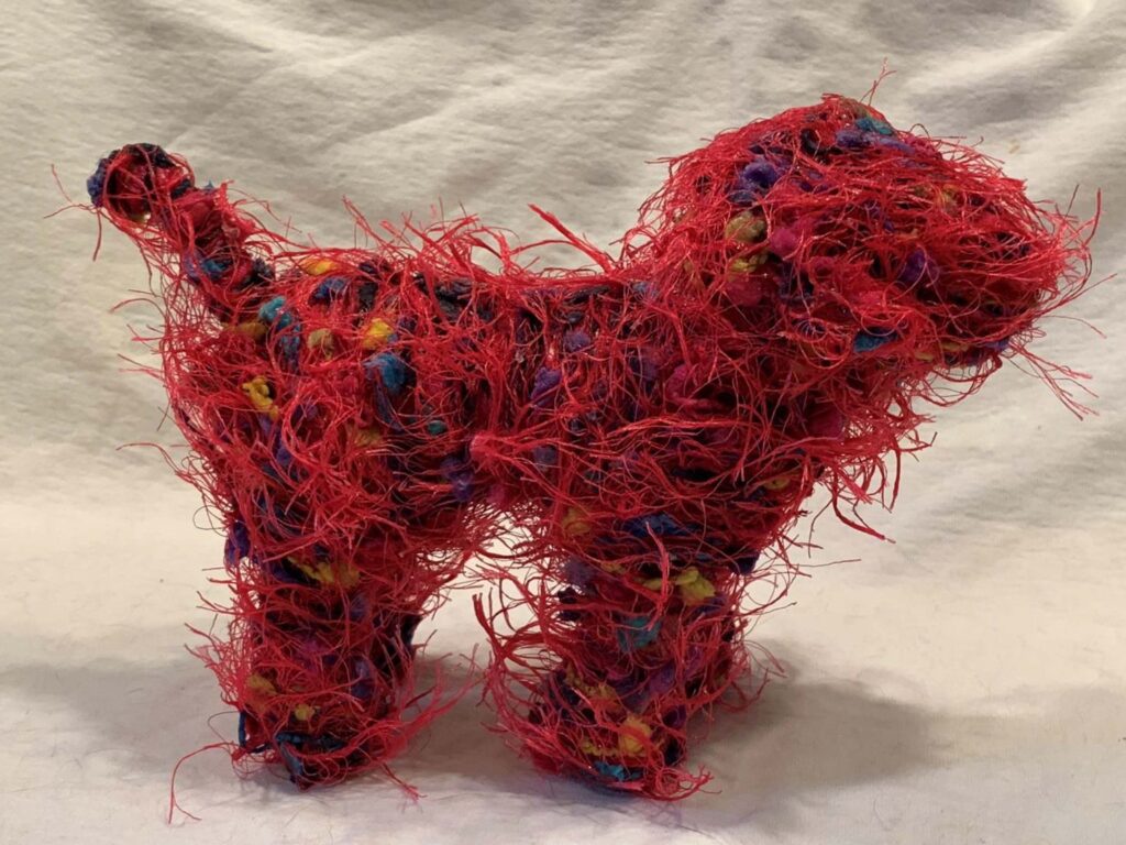 HONORABLE MENTION: Red Dog, Mixed Media by Passle Helminski, 6in x 8in x 4in, $100 (July 2022)